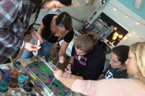 Students painting. 